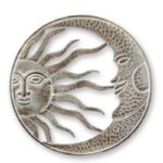AN IRON WALL DECORATION OF THE SUN AND MOON