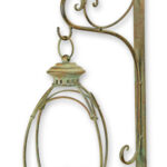 A WALL MOUNT IRON BIRD FEEDER